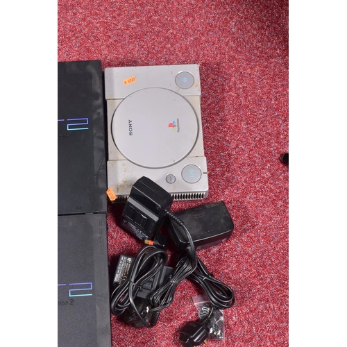 212 - TWO BOXES OF BROKEN CONSOLES AND ACCESSORIES, contents include six Playstation 2 consoles, two Plays... 