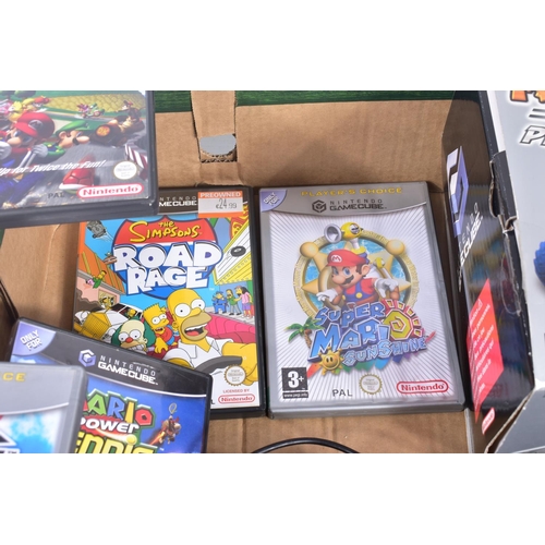 215 - A BOXED NINTENDO GAMECUBE, GAMES, CONTROLLERS AND MEMORY CARD, games include Super Mario Sunshine, M... 