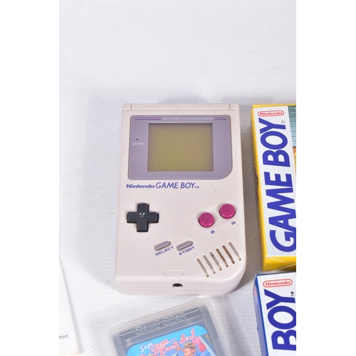 216 - A GAMEBOY AND QUANTITY OF GAMEBOY GAMES, games include Tetris, Boxle, Boxle II (boxed), Super Scrabb... 