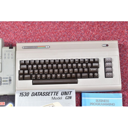 217 - A COMMODORE 64 COMPUTER, TAPE PLAYERS AND A SMALL QUANTITY OF GAMES, games include Club Record Contr... 