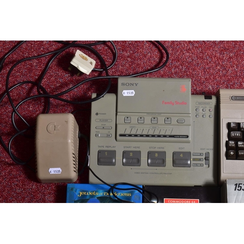 217 - A COMMODORE 64 COMPUTER, TAPE PLAYERS AND A SMALL QUANTITY OF GAMES, games include Club Record Contr... 