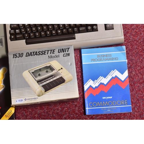 217 - A COMMODORE 64 COMPUTER, TAPE PLAYERS AND A SMALL QUANTITY OF GAMES, games include Club Record Contr... 