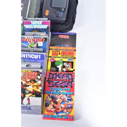 219 - A SEGA GAME GEAR, AND QUANTITY OF GAMES, games include Sonic The Hedgehog, Super Space Invaders, Shi... 