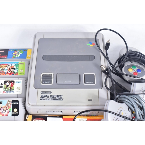 221 - SNES CONSOLE AND QUANTITY OF GAMES, games include Super Mario World, Super Mario All Stars, Street F... 