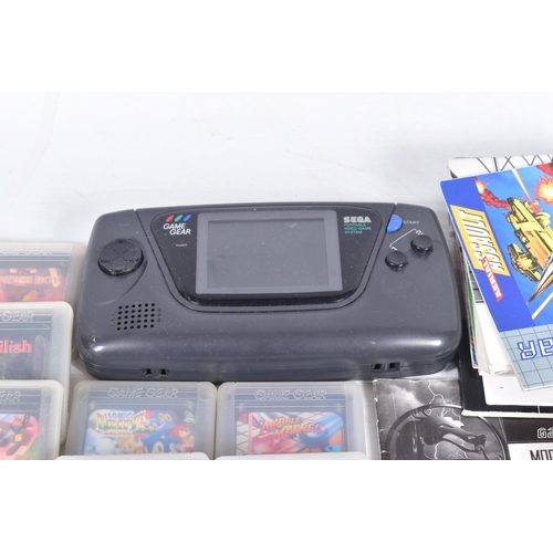 224 - SEGA GAME GEAR AND QUANTITY OF GAMES, most games include their mannuals, games include Sonic The Hed... 