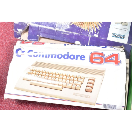 228 - A BOXED COMMODORE 64 (C64 MODEL), ACCESSORIES AND A QUANTITY OF GAMES, accessories include a dataset... 