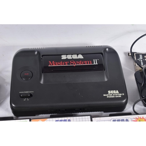 231 - SEGA MASTER SYSTEM II & GAMES, games include Sega Chess, Super Kick Off and World Class Leader Board... 