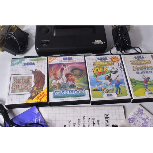 231 - SEGA MASTER SYSTEM II & GAMES, games include Sega Chess, Super Kick Off and World Class Leader Board... 