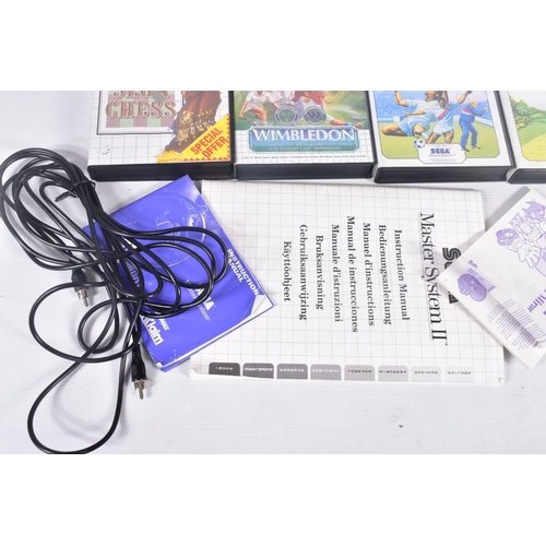 231 - SEGA MASTER SYSTEM II & GAMES, games include Sega Chess, Super Kick Off and World Class Leader Board... 