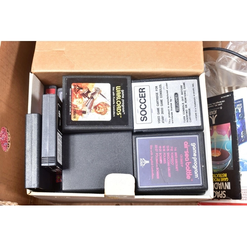 233 - ATARI 2600 CONSOLES AND GAMES, games include the notorious E.T., Jr. Pacman, Breakout, Super Breakou... 