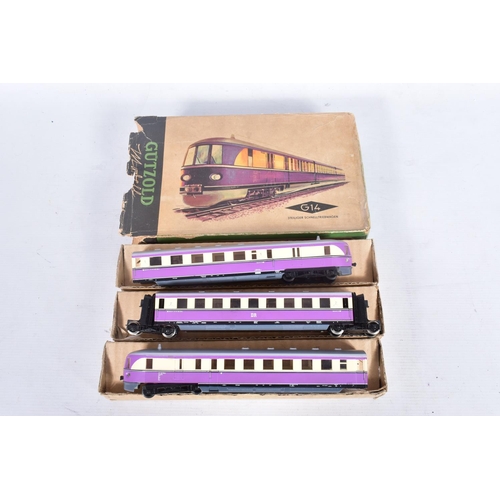 248 - FOUR BOXED GUTZOLD HO GAUGE LOCOMOTIVES, three V180 diesels (EM19 (x 2) and EM20) and a BR120 diesel... 