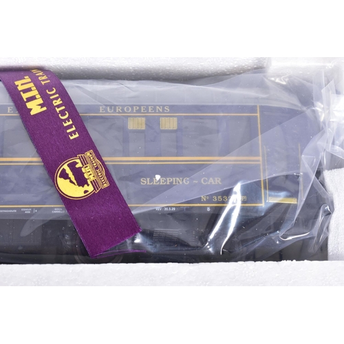 257 - A BOXED M.T.H. ELECTRIC TRAINS O GAUGE 5-CAR FRENCH S.N.C.F. ORIENT EXPRESS PASSENGER SET, No.20-600... 