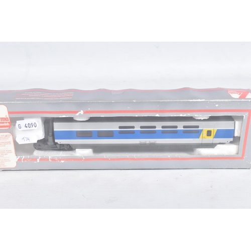 260 - A BOXED LIMA GOLDEN SERIES HO GAUGE S.N.C.F. TGV FOUR CAR SET, No.149711GP, with three boxed additio... 