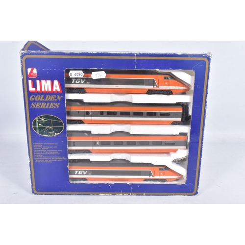 260 - A BOXED LIMA GOLDEN SERIES HO GAUGE S.N.C.F. TGV FOUR CAR SET, No.149711GP, with three boxed additio... 