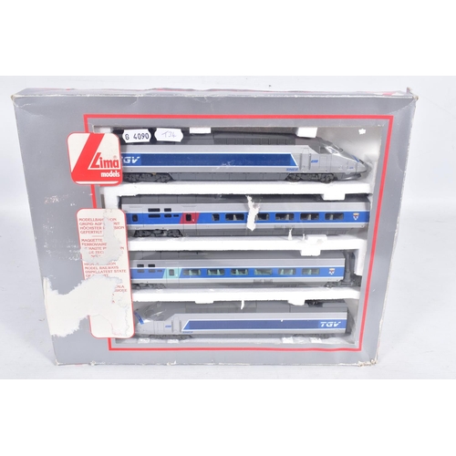 260 - A BOXED LIMA GOLDEN SERIES HO GAUGE S.N.C.F. TGV FOUR CAR SET, No.149711GP, with three boxed additio... 