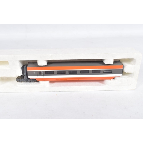 260 - A BOXED LIMA GOLDEN SERIES HO GAUGE S.N.C.F. TGV FOUR CAR SET, No.149711GP, with three boxed additio... 