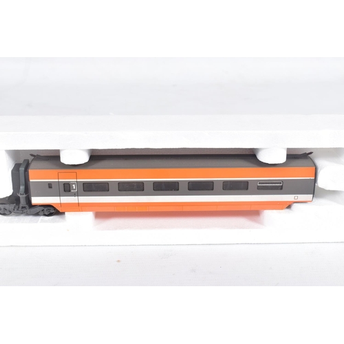 260 - A BOXED LIMA GOLDEN SERIES HO GAUGE S.N.C.F. TGV FOUR CAR SET, No.149711GP, with three boxed additio... 