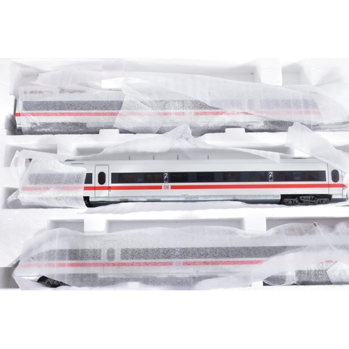 261 - A BOXED LIMA COLLECTION HO GAUGE D.B. ICE-T THREE CAR SET, No.L149933, with an additional two coach ... 