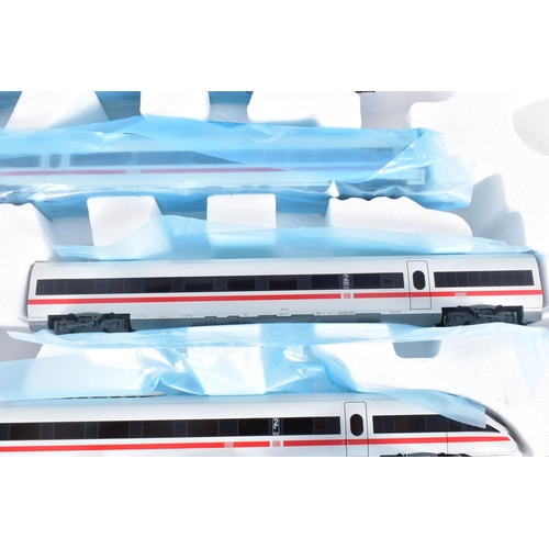 290 - A BOXED ROCO HO GAUGE D.B. ICE-TD FOUR CAR SET, No.63031, all EX with unused accessory packs and ins... 