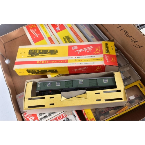 301 - A QUANTITY OF BOXED AND UNBOXED HO GAUGE ROLLING STOCK, mixture of passenger and freight stock, boxe... 