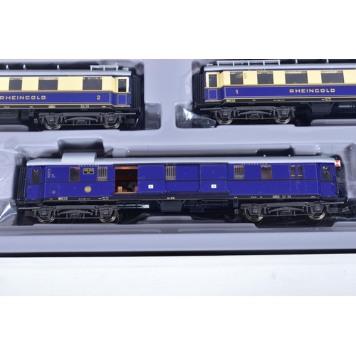 311 - A BOXED TRIX HO GAUGE D.R.G. 'RHEINGOLD' FIVE COACH SET, No21214, with unopened accessory pack, EX i... 