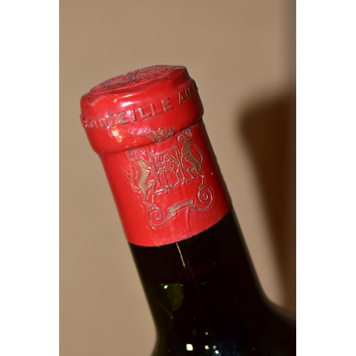 271 - CHATEAU MOUTON ROTHSCHILD 1952, 1er Cru Classe, cette bouteille porte le no. 004,689, fill level mid... 