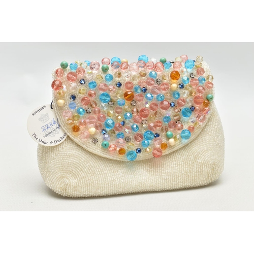 97 - DUKE AND DUCHESS OF WINDSOR INTEREST, a Bergdorf Goodman coloured and white beaded pochette, the two... 