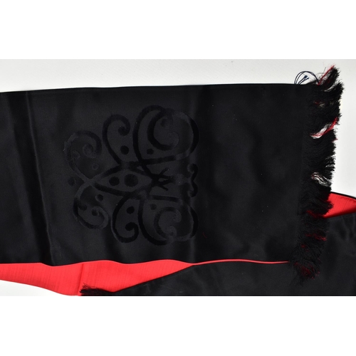 99 - DUKE AND DUCHESS OF WINDSOR INTEREST, a French black and red silk scarf / stole with fringed ends an... 