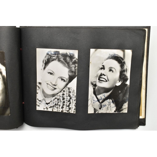 191 - FILM STAR SIGNED PHOTOGRAPHS in one album containing 120 photographs of some of the biggest Hollywoo... 