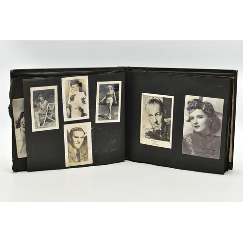 191 - FILM STAR SIGNED PHOTOGRAPHS in one album containing 120 photographs of some of the biggest Hollywoo... 