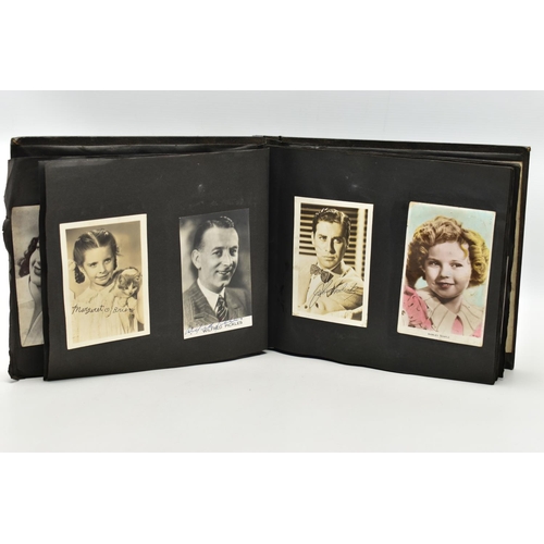 191 - FILM STAR SIGNED PHOTOGRAPHS in one album containing 120 photographs of some of the biggest Hollywoo... 