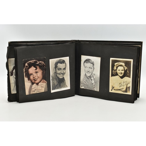 191 - FILM STAR SIGNED PHOTOGRAPHS in one album containing 120 photographs of some of the biggest Hollywoo... 