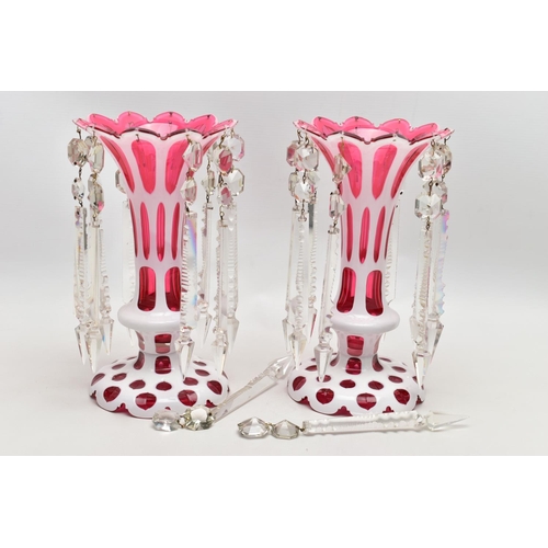 102 - A PAIR OF LATE 19TH CENTURY CRANBERRY AND WHITE OVERLAID LUSTRES, frilled rim over oval and circular... 