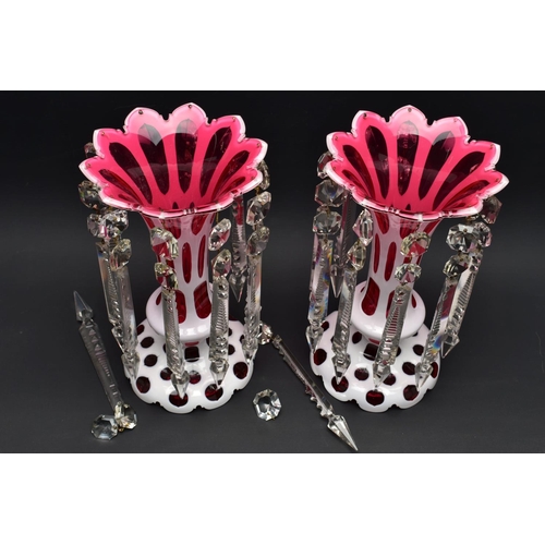 102 - A PAIR OF LATE 19TH CENTURY CRANBERRY AND WHITE OVERLAID LUSTRES, frilled rim over oval and circular... 