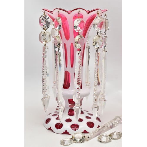 102 - A PAIR OF LATE 19TH CENTURY CRANBERRY AND WHITE OVERLAID LUSTRES, frilled rim over oval and circular... 