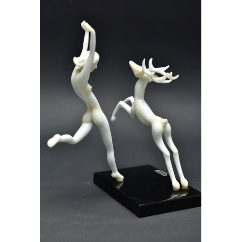 103 - AN ART DECO STYLE GLASS LAMPWORK FIGURE GROUP BY ISTVAN KOMAROMY, of a female nude and leaping stag,... 