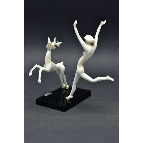 103 - AN ART DECO STYLE GLASS LAMPWORK FIGURE GROUP BY ISTVAN KOMAROMY, of a female nude and leaping stag,... 