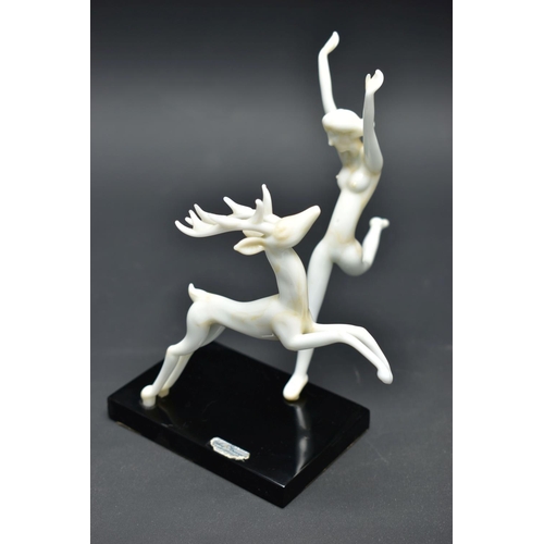 103 - AN ART DECO STYLE GLASS LAMPWORK FIGURE GROUP BY ISTVAN KOMAROMY, of a female nude and leaping stag,... 