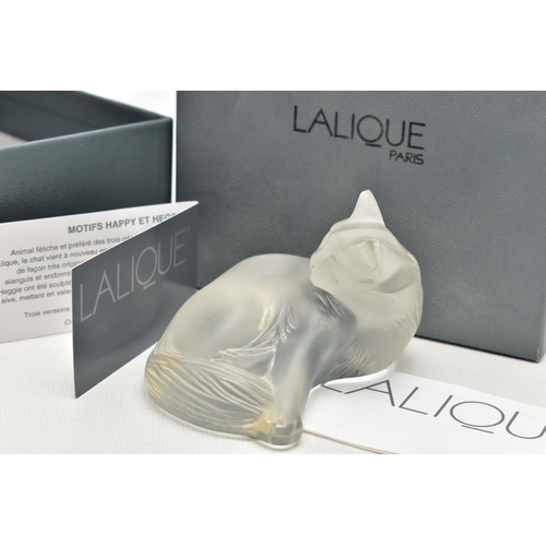 108 - A BOXED LALIQUE HAPPY CAT, serial number 1179500, modelled as a recumbent cat, etched mark to base, ... 