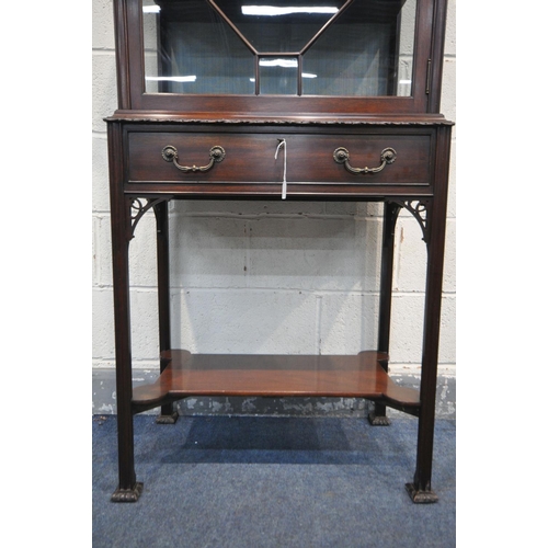 228 - A LIBERTY OF LONDON EDWARDIAN MAHOGANY DISPLAY CABINET, the single astragal glazed door enclosing a ... 