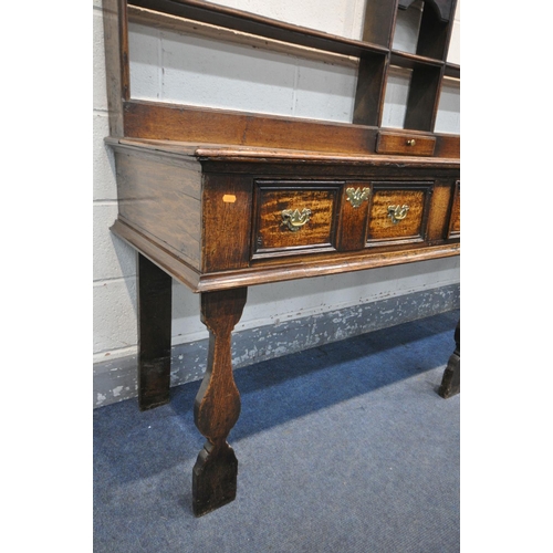 233 - A GEORGE III OAK DRESSER, the top with an arrangement of shelving, and a single drawer, over a base ... 