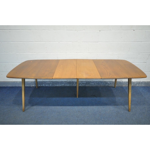 236 - LUCIAN ERCOLANI FOR ERCOL, A MODEL 510 ELM AND BEECH SLIDE LEG EXTENDING TABLE, with a double foldab... 