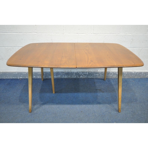 236 - LUCIAN ERCOLANI FOR ERCOL, A MODEL 510 ELM AND BEECH SLIDE LEG EXTENDING TABLE, with a double foldab... 