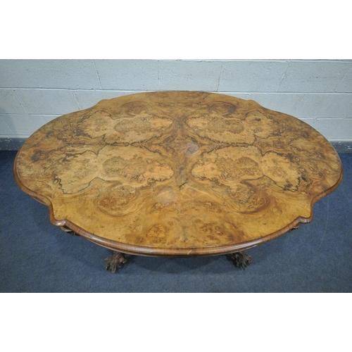 244 - A VICTORIAN BURR WALNUT CENTRE TABLE, the wavy top that's quarter veneered with a moulded edge, on a... 