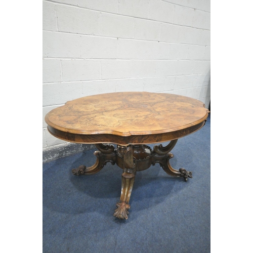 244 - A VICTORIAN BURR WALNUT CENTRE TABLE, the wavy top that's quarter veneered with a moulded edge, on a... 