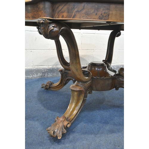 244 - A VICTORIAN BURR WALNUT CENTRE TABLE, the wavy top that's quarter veneered with a moulded edge, on a... 