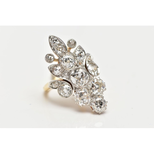 1 - AN EARLY 20TH CENTURY DIAMOND DRESS RING, comprised of seventeen old cut diamonds ranging in size, p... 