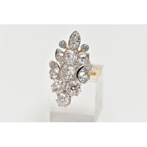 1 - AN EARLY 20TH CENTURY DIAMOND DRESS RING, comprised of seventeen old cut diamonds ranging in size, p... 