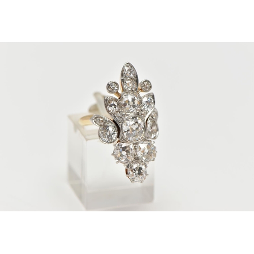 1 - AN EARLY 20TH CENTURY DIAMOND DRESS RING, comprised of seventeen old cut diamonds ranging in size, p... 