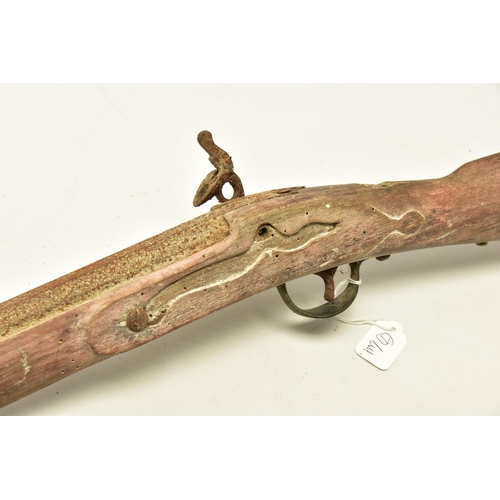 327 - AN ANTIQUE RELIC FLINTLOCK MUSKET fitted with a 51   barrel, it is missing its ramrod, top jaw and s... 